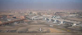 This picture taken on January 15, 2021 shows an aerial view of aircraft on the tarmac at Cairo International Airport. (Photo by Amir MAKAR / AFP)